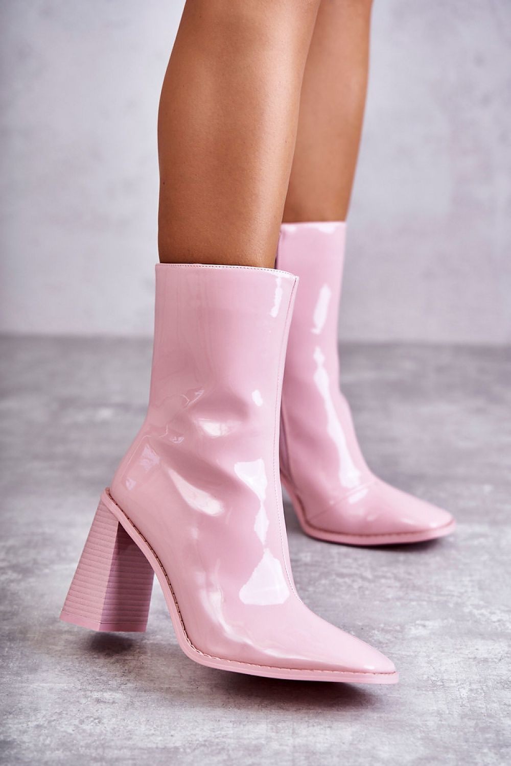  Mid-calf stiletto boots with side zipper and padded heel – side view.