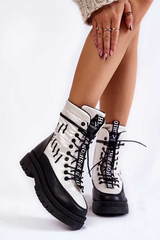 Front view of women’s eco leather snow boots with laces and fur lining