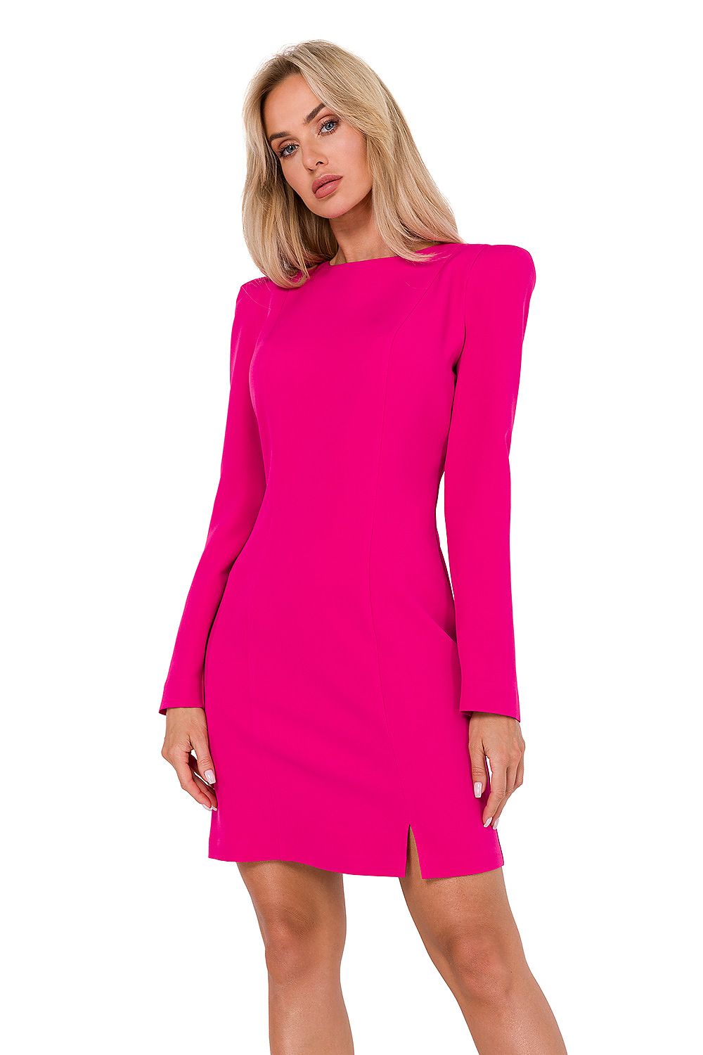 Woman wearing a bright pink dress on a white background
