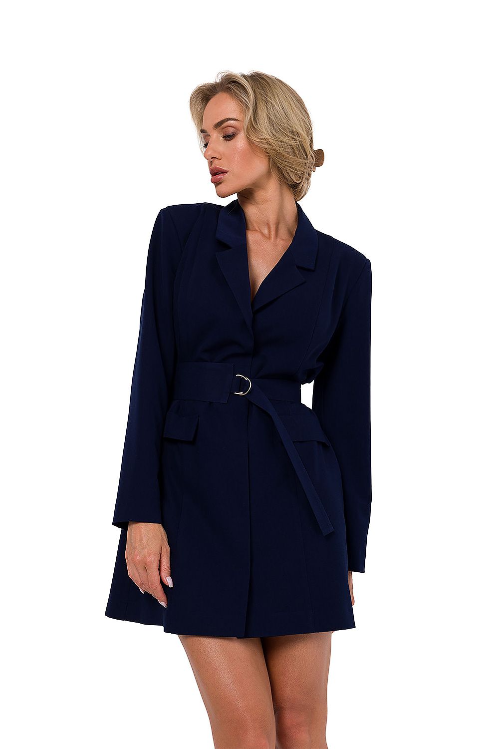 Woman wearing a navy blue blazer dress on a white background