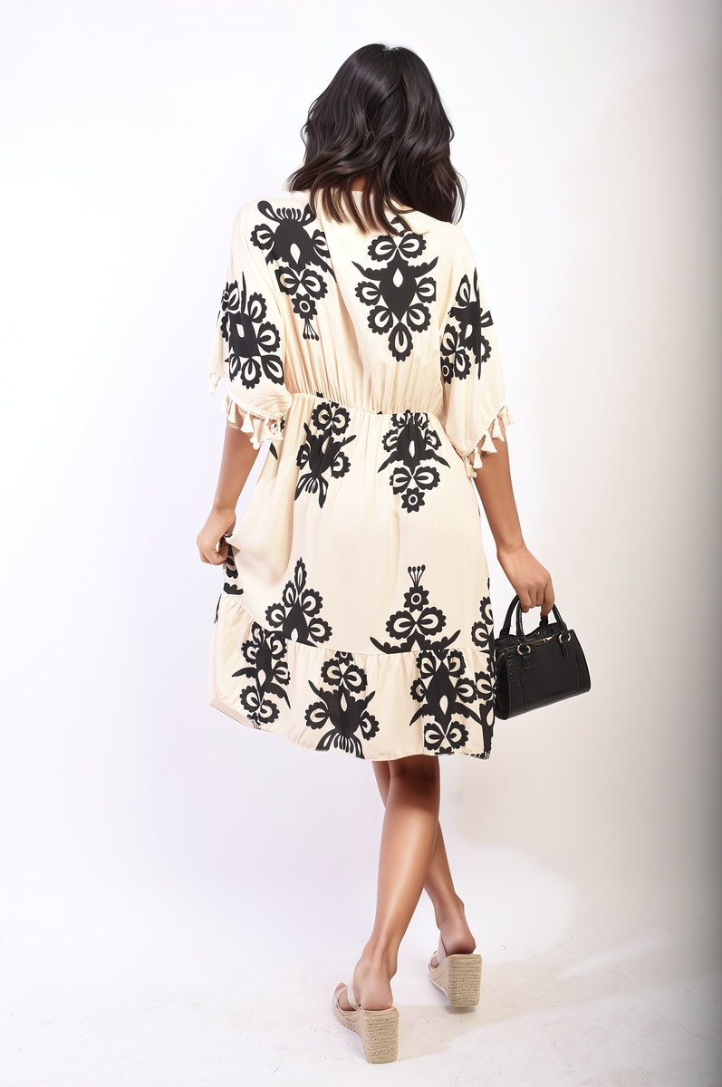 Printed V-Neck Short Sleeve Midi Dress with Tassel Detail