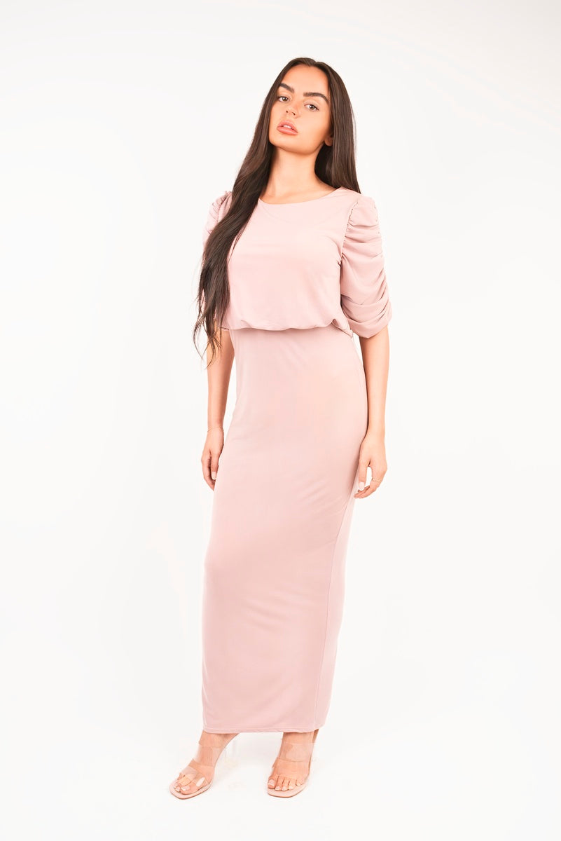 “Pink ruched short sleeve maxi dress with draped bodice, front view”