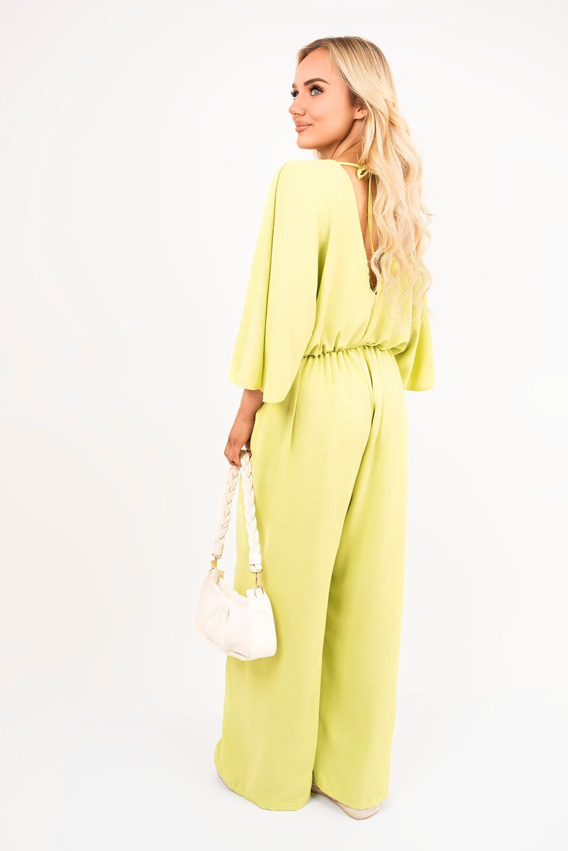 Avocado: “Wide leg V-neck jumpsuit in avocado with back tie detail, side view”